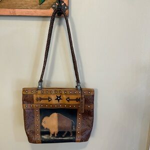 Beautiful black & cognac color leather buffalo & silver Conchos Scully bag